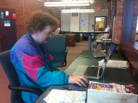 Linda Tubbs of the Professional Volunteers Corps works on her Pinterest page.